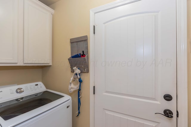 8507 Barstow Dr, Amarillo, TX 79118 - washroom featuring washer / clothes dryer and cabinet space