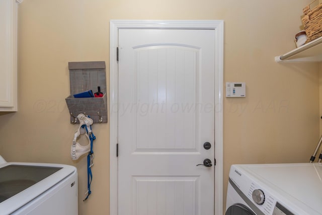 8507 Barstow Dr, Amarillo, TX 79118 - laundry room featuring washing machine and clothes dryer and cabinet space