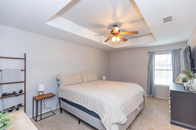 8507 Barstow Dr, Amarillo, TX 79118 - bedroom with a raised ceiling, light carpet, and ceiling fan