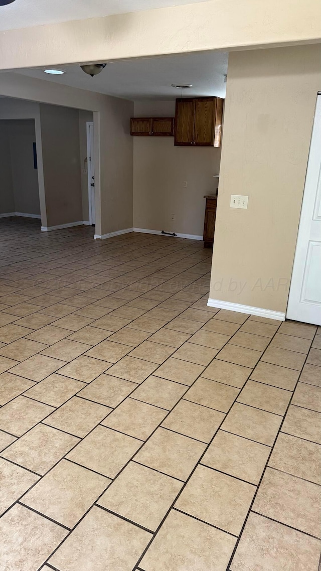 3101 Browning St, Amarillo, TX 79103 - unfurnished living room featuring baseboards and light tile patterned floors