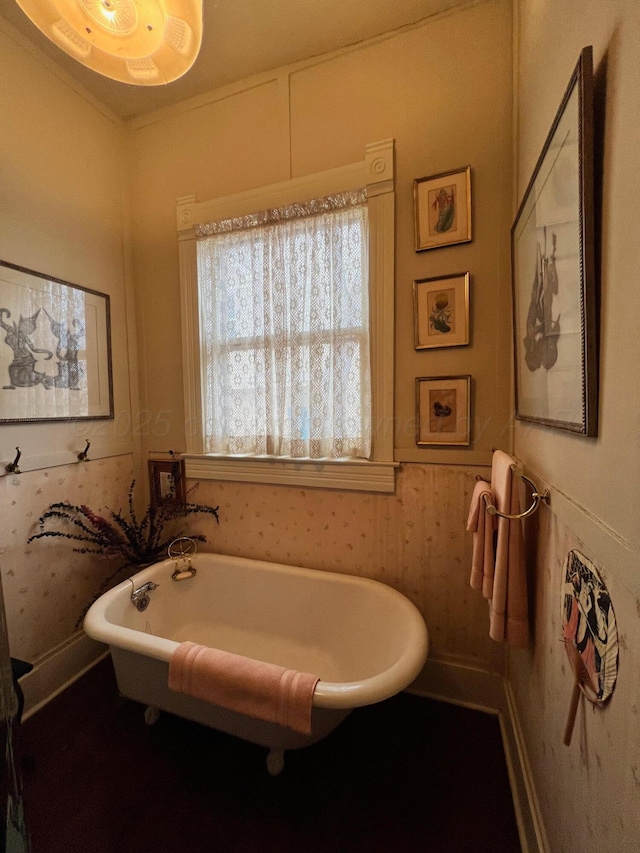 bathroom with a tub to relax in