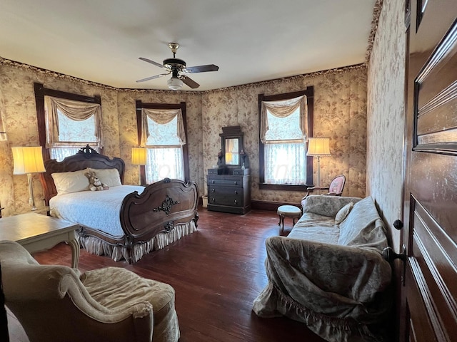 bedroom featuring dark wood-type flooring and ceiling fan