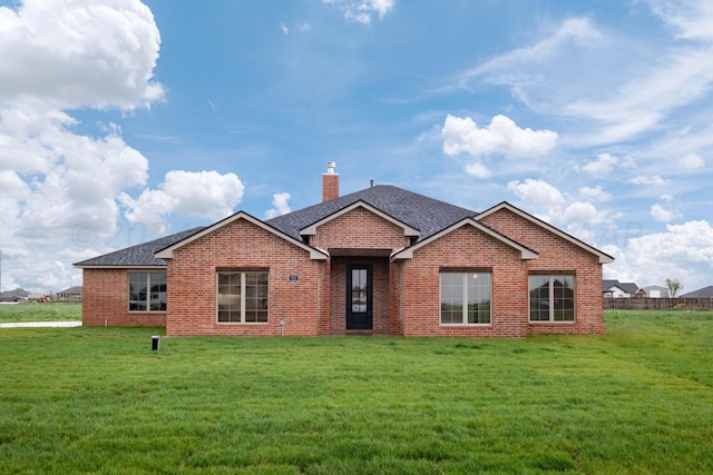 view of front of property with a front lawn