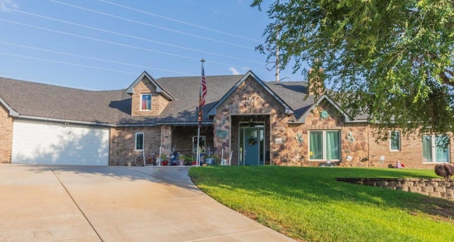 view of front facade featuring a garage and a front lawn