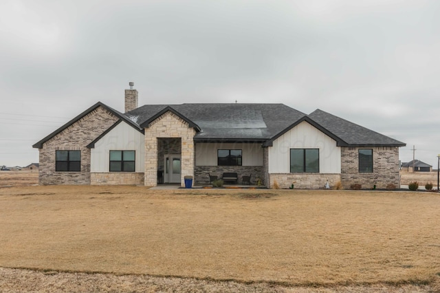 view of front of property with a front lawn