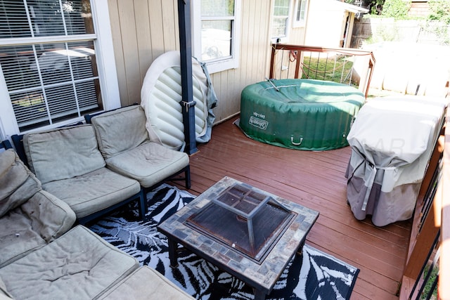 1611 S Palo Duro St, Amarillo, TX 79106 - wooden deck featuring a fire pit