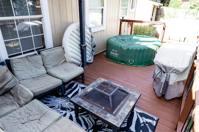 1611 S Palo Duro St, Amarillo, TX 79106 - wooden deck with an outdoor living space with a fire pit