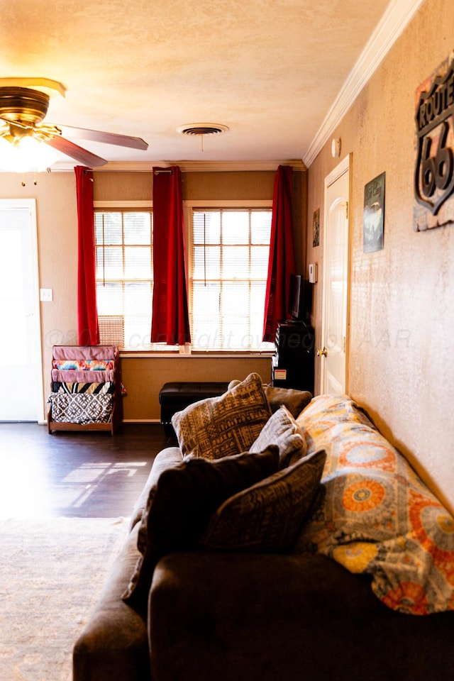 1611 S Palo Duro St, Amarillo, TX 79106 - living area with crown molding, plenty of natural light, a ceiling fan, and wood finished floors