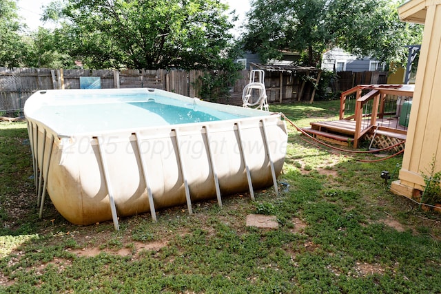 1611 S Palo Duro St, Amarillo, TX 79106 - view of swimming pool featuring a fenced backyard and a deck