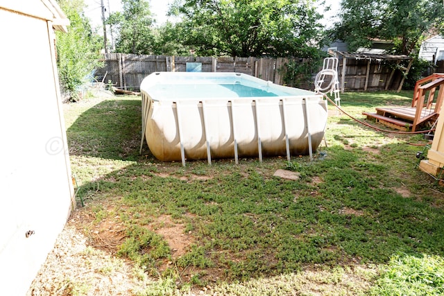 1611 S Palo Duro St, Amarillo, TX 79106 - view of swimming pool featuring a fenced backyard
