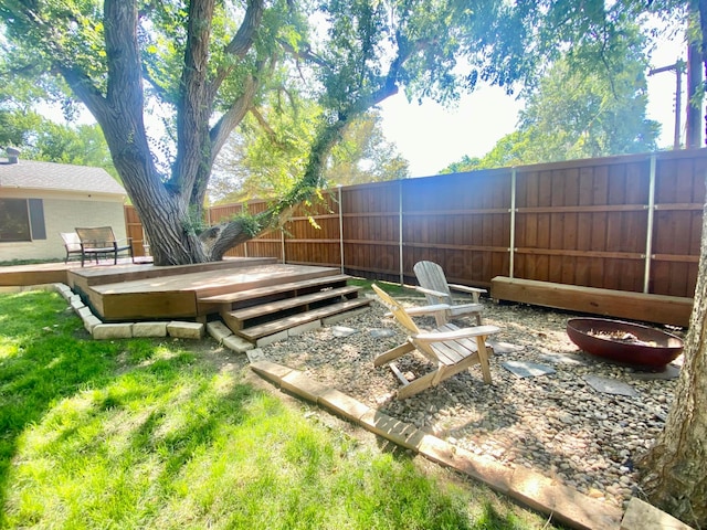 view of yard featuring a deck