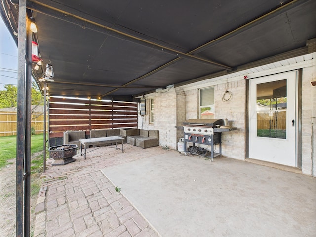 2600 Comanche Trl, Pampa, TX 79065 - view of patio featuring a fire pit and grilling area