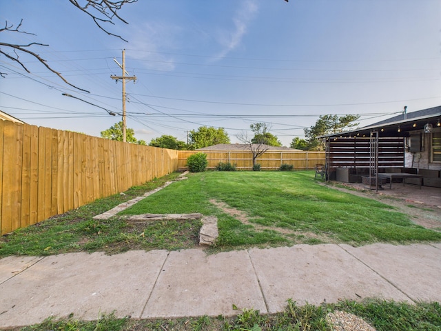 2600 Comanche Trl, Pampa, TX 79065 - fenced backyard with a patio