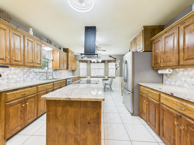 2600 Comanche Trl, Pampa, TX 79065 - kitchen with a center island, backsplash, light tile patterned floors, and stainless steel appliances