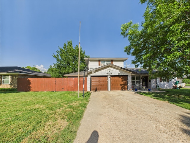 2600 Comanche Trl, Pampa, TX 79065 - view of front of property featuring a garage and concrete driveway