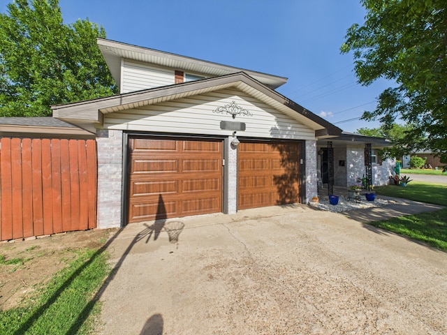 2600 Comanche Trl, Pampa, TX 79065 - garage featuring concrete driveway