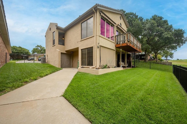 25 Crenshaw St, Amarillo, TX 79124 - rear view of house with stucco siding and a deck