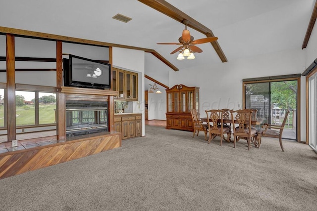 25 Crenshaw St, Amarillo, TX 79124 - living area featuring light colored carpet, beam ceiling, ceiling fan, and high vaulted ceiling