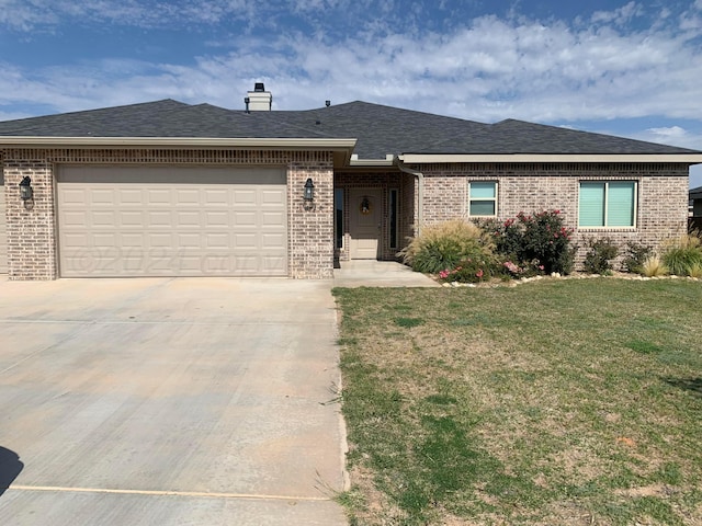 ranch-style house with a front lawn and a garage