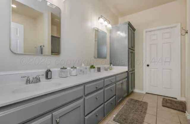 4014 Willow St, Amarillo, TX 79118 - full bathroom featuring tile patterned floors, double vanity, and baseboards