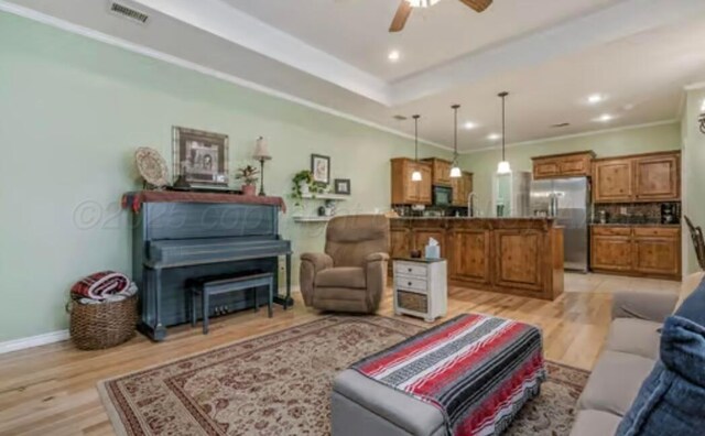 4014 Willow St, Amarillo, TX 79118 - living area featuring a ceiling fan, light wood finished floors, crown molding, baseboards, and recessed lighting