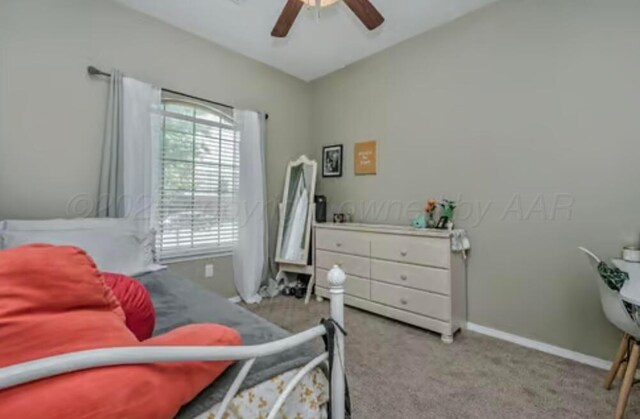 4014 Willow St, Amarillo, TX 79118 - bedroom with carpet flooring, baseboards, and a ceiling fan