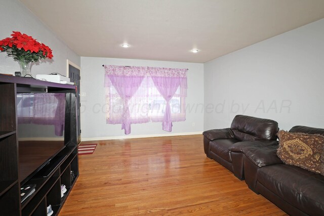 4116 Cimarron Ave, Amarillo, TX 79102 - living area with wood finished floors and recessed lighting