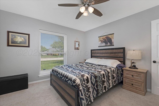 4022 Pinehurst Dr, Amarillo, TX 79109 - bedroom featuring light colored carpet, baseboards, and a ceiling fan