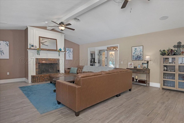 4022 Pinehurst Dr, Amarillo, TX 79109 - living area with ceiling fan, light wood-type flooring, baseboards, and a brick fireplace