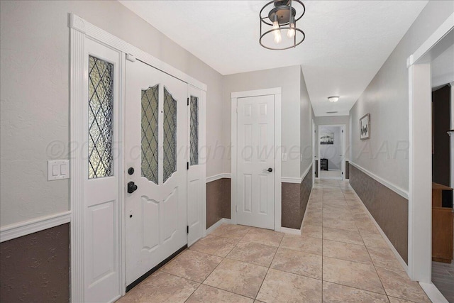 4022 Pinehurst Dr, Amarillo, TX 79109 - entrance foyer with baseboards and light tile patterned flooring