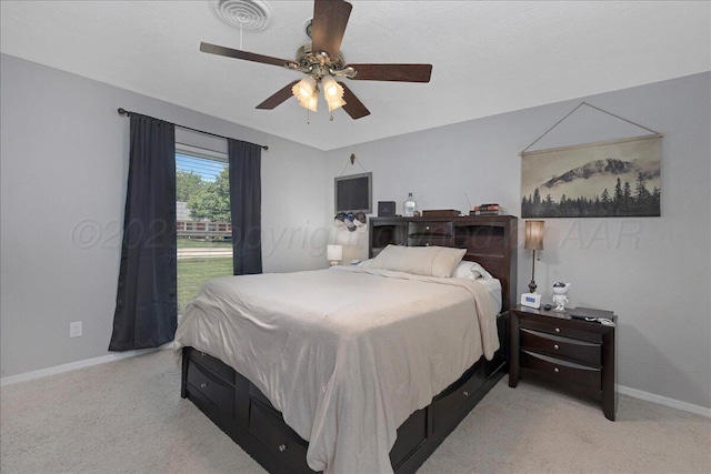 4022 Pinehurst Dr, Amarillo, TX 79109 - bedroom featuring light colored carpet, baseboards, and ceiling fan