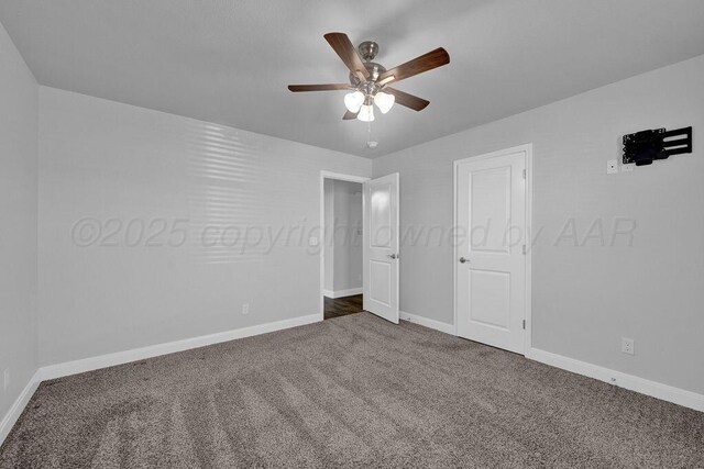 2709 Tampa Bay Ave, Amarillo, TX 79118 - unfurnished bedroom with dark carpet, baseboards, and a ceiling fan