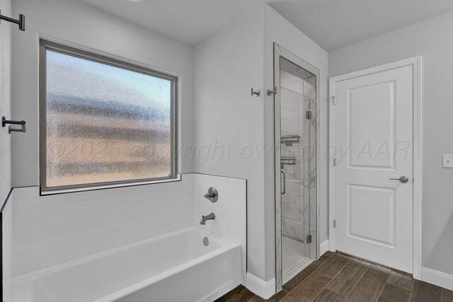 2709 Tampa Bay Ave, Amarillo, TX 79118 - full bath with a stall shower, baseboards, a garden tub, and healthy amount of natural light