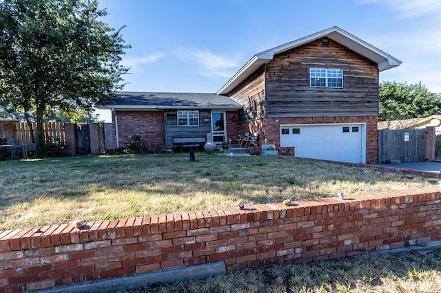 1207 Lee St, Borger, TX 79007 - tri-level home with an attached garage and brick siding
