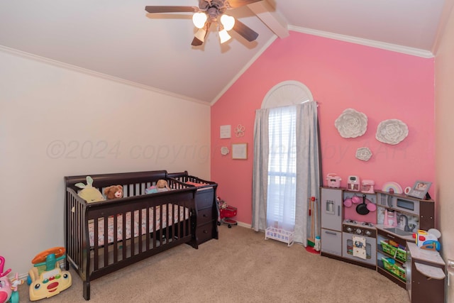 bedroom featuring carpet, ornamental molding, a nursery area, lofted ceiling with beams, and ceiling fan