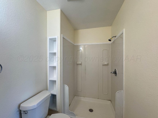 5207 While A Way Rd, Amarillo, TX 79109 - full bath featuring a stall shower and a textured wall