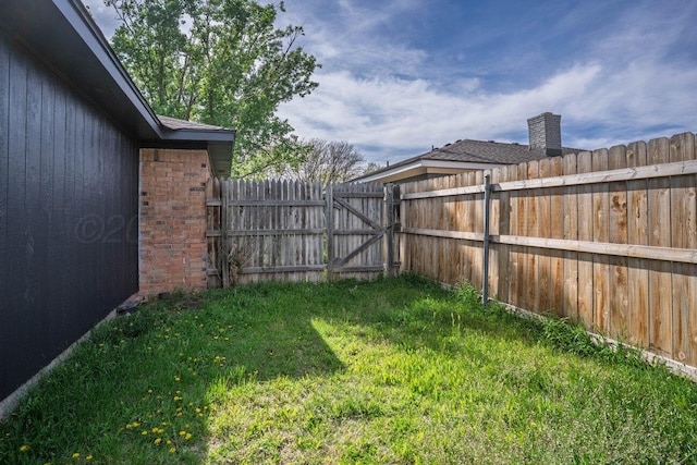 5207 While A Way Rd, Amarillo, TX 79109 - view of yard with a gate