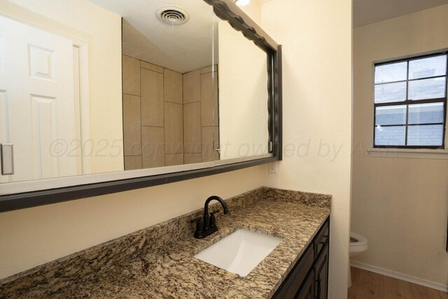 5207 While A Way Rd, Amarillo, TX 79109 - full bath with vanity and wood finished floors