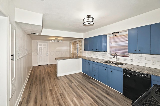 1603 SW 35th Ave, Amarillo, TX 79109 - kitchen with blue cabinetry, a sink, black dishwasher, dark wood-type flooring, and tasteful backsplash