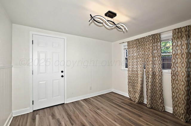 1603 SW 35th Ave, Amarillo, TX 79109 - empty room with dark wood-style floors and baseboards