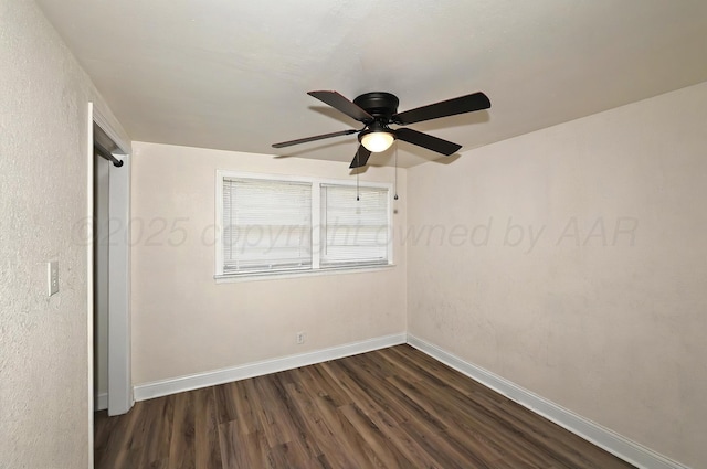 1603 SW 35th Ave, Amarillo, TX 79109 - spare room featuring dark wood finished floors, baseboards, and ceiling fan