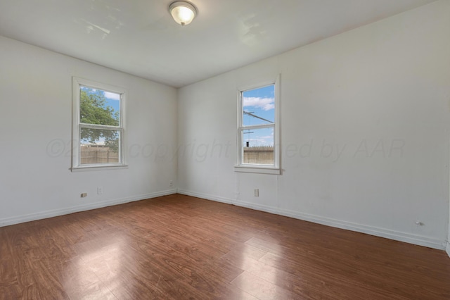 823 Ave N, Sunray, TX 79086 - empty room with wood finished floors and baseboards