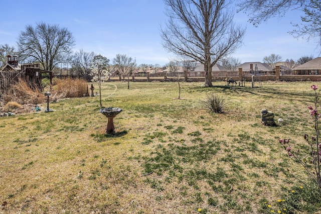 view of yard featuring fence