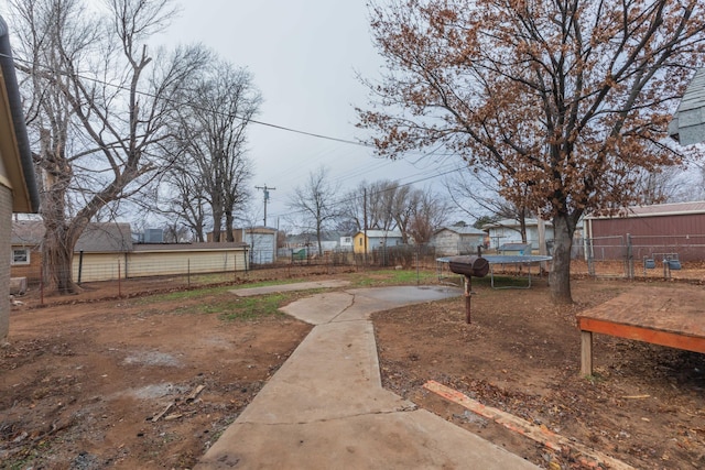 view of yard with a trampoline