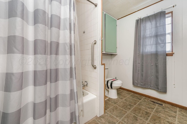 bathroom featuring shower / bathtub combination with curtain and toilet