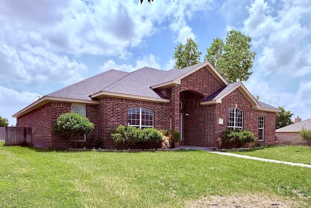 9317 Shylana Ave, Amarillo, TX 79119 - view of front of home featuring brick siding and a shingled roof