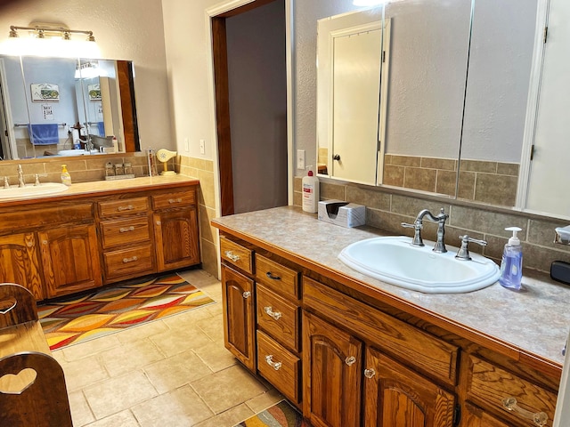 bathroom featuring tasteful backsplash and vanity