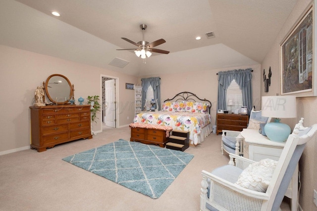 carpeted bedroom with visible vents, baseboards, vaulted ceiling, recessed lighting, and a ceiling fan