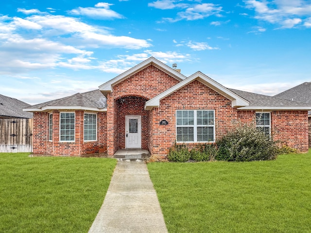 ranch-style house with a front yard