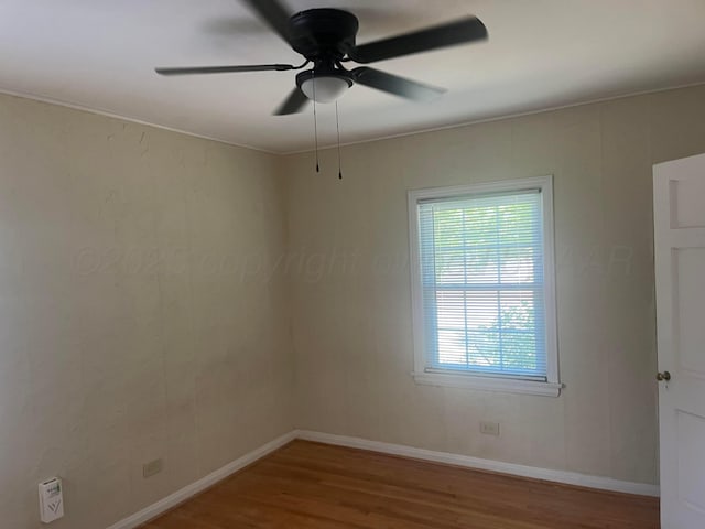 2409 S Tyler St, Amarillo, TX 79109 - empty room featuring wood finished floors, ceiling fan, and baseboards